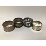 FOUR VARIOUS HALLMARKED SILVER NAPKIN RINGS TOTAL WEIGHT IS APPROX 62.4G