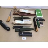 A COLLECTION OF KNIVES AND DAGGERS MOSTLY OF NORDIC MAKERS INCLUDING MARTINI AND MORE, MOST OF WHICH