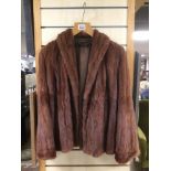 A VINTAGE FUR COAT