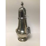 A HALLMARKED SILVER BALUSTER SHAPED SUGAR SIFTER, 16CM, DATED 1930, BIRMINGHAM TOTAL WEIGHT IS