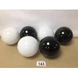 SIX DECORATIVE GLASS BALLS THREE BLACK THREE WHITE, 9CM DIAMETER
