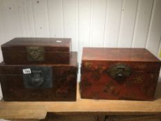 THREE HANDPAINTED LEATHER LACQUERED ORIENTAL BOXES, LARGEST 40 X 27 X 25CM