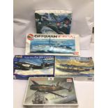 FIVE VINTAGE BOXED PLASTIC MODEL KITS OF AIRCRAFTS AND A GERMAN E BOAT (CONTENTS UNCHECKED) TWO OF
