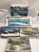 FIVE VINTAGE BOXED PLASTIC MODEL KITS OF AIRCRAFTS AND A GERMAN E BOAT (CONTENTS UNCHECKED) TWO OF