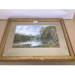 A 19TH CENTURY GILDED FRAMED AND GLAZED WATERCOLOUR ON CANVAS OF A RIVER VIEW WITH CASTLE '