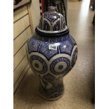 A LARGE CERAMIC HANDCRAFTED GLAZED LIDDED URN WITH A MOORISH PATTERN BLUE MOROCCAN, WITH MARKS TO