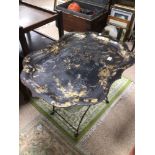 AN TOLLE WORK ANTIQUE BLACK METAL FOLD AWAY TRAY WITH GILDING PAINTING A/F TO THE TOP