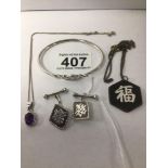 FOUR SILVER AND WHITE METAL ITEMS, SILVER BANGLE MARKED 925 CMB WITH ORIENTAL NECKLACE AND PENDANT