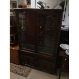 A VINTAGE OLD CHARM OAK DISPLAY CABINET WITH STORAGE AND LEADED GLASS WITH LIGHTS 107 X 161 X 38CM