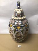 A LARGE HANDPAINTED CERAMIC FLORAL PATTERN DELFT VASE WITH FOO DOG ON TOP MARKS TO BASE, 51CM