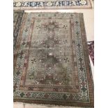 A VINTAGE PERSIAN WOOL RUG, 205 X 138CM