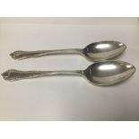 A PAIR OF HALLMARKED SILVER DESSERT SPOONS WITH CAST TERMINALS, 18.5CM JAMES DIXON & SONS, DATED