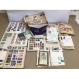 A LARGE COLLECTION OF VINTAGE EPHEMERA, INCLUDES STAMPS AND POSTCARDS