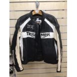 AN ORIGINAL TRIUMPH LEATHER MOTORCYCLE JACKET, SIZE 44