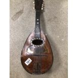 A MANDOLIN WITH INLAID TORTOISESHELL AND MOTHER OF PEARL DETAILING A/F