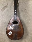 A MANDOLIN WITH INLAID TORTOISESHELL AND MOTHER OF PEARL DETAILING A/F