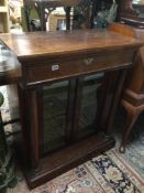 A REGENCY ROSEWOOD COLUMN FRONTED CABINET WITH A TP DRAWER, 86 X 43 X 103CM