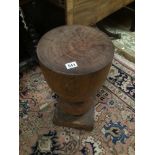 A HAND CARVED TAM TAM STOOL MADE FROM NATURAL WOOD, 57CM