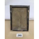 A CHINESE SILVER PHOTO FRAME 19 X 14CM