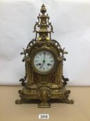 A FRENCH JAPY FRERES GILT MANTLE CLOCK WITH ENAMEL DIAL (MISSING PENDULUM AND KEY) 45CM