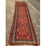 A VINTAGE KAZAK RUNNER/RUG, 430 X 110CM