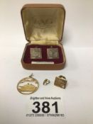 A PAIR OF SILVER GILT CUFFLINKS, A GOLD TOOTH, 14K YELLOW METAL PIN AND CRUISE SHIP PENNANT TOTAL
