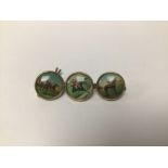 A SET OF THREE HUNTING THEMED ENAMELLED BUTTONS