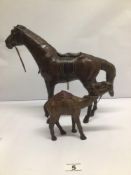 TWO VINTAGE LEATHER-WRAPPED FIGURES OF A HORSE AND CAMEL LARGEST APPROX 31CM HIGH A/F