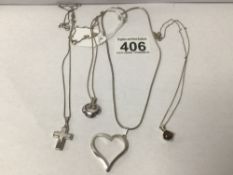 FOUR SILVER AND WHITE METAL NECKLACES WITH PENDANTS, 23 GRAMS