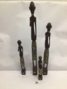 A SET OF FOUR VINTAGE AFRICAN CARVED WOOD HUMAN FIGURES, TALLEST APPROX 50CM