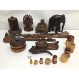 A COLLECTION OF VINTAGE AFRICAN WOODEN FIGURES AND POTS TOGETHER WITH A NESTING DOLL AND A SHOE HORN