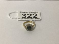 A HALLMARKED 18CT GOLD SAPPHIRE & DIAMOND RING 3.7G NIBBLES TO CENTRE STONE