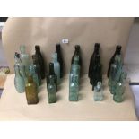 A CRATE OF EARLY GLASS BOTTLES, WHITE HANBURY AND MORE