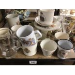 AN EXTENSIVE COLLECTION OF COMMEMORATIVE MUGS, GLASSES, AND PLATES OF THE BRITISH ROYAL FAMILY, WITH