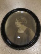 A VINTAGE OVAL FRAMED PICTURE OF A LADY, 60 X 49CM