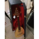 A GLNVG SIX STRING LUTE GUITAR WITH HARDCASE