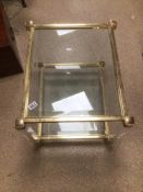 A VINTAGE BRASS AND GLASS TWO TIER TABLE 78 X 50CM