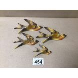 A SET OF FOUR VINTAGE WALL MOUNT BIRDS, METAL AND HANDPAINTED A/F