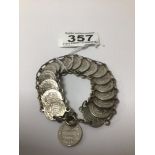 A SILVER PLATED COIN STYLE BRACELET