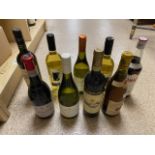 TEN SEALED BOTTLES OF MIXED ALCOHOL WITH CONTENTS, INCLUDES CHATEAU DE LA MALTROYE, 1988 AND MORE