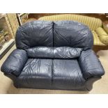 A MODERN TWO SEATER LEATHER SOFA