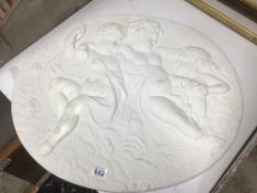 A ROUND PLASTER WALL MOUNT, 70CM