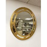 A ROUND MODERN GILDED MIRROR, 70CM DIAMETER