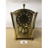 A VINTAGE BRASS MANTLE CLOCK BY KOMA, 23CM