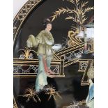 A ROUND BLACK LACQUERED CHINOISERIE WALL PLAQUE, 76CM DIAMETER