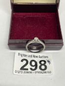 A PLATINUM AND DIAMOND SOLITAIRE RING, 3 GRAMS SIZE