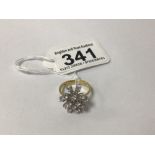 A 750 18 CARAT GOLD SNOWFLAKE RING WITH DIAMONDS SET IN PLATINUM SIZE O