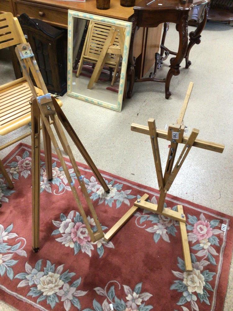 TWO WOODEN FOLDING EASELS