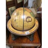 A TABLE TOP WORLD DISCOVERER WOODEN FRAMED GLOBE, 46CM HIGH