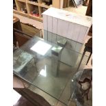 AN UNUSUAL TEMPERED GLASS SWIVEL TABLE WITH CHROME FRAME ENCLOSED 90 X 90 X 70CM